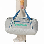 Patagonia Black Hole Duffel 70L in Birch White model carrying bag with handles