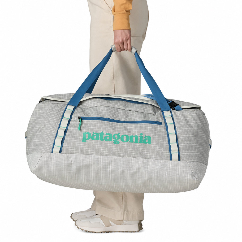 Patagonia Black Hole Duffel 70L in Birch White model carrying bag with handles