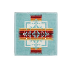 Pendleton Chief Joseph Aqua towel collection with soft cotton velour and colorful woven design in wash cloth size