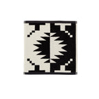 Pendleton Spider Rock Black/White cotton towels highlighting the jacquard pattern and plush velour texture in wash cloth size.