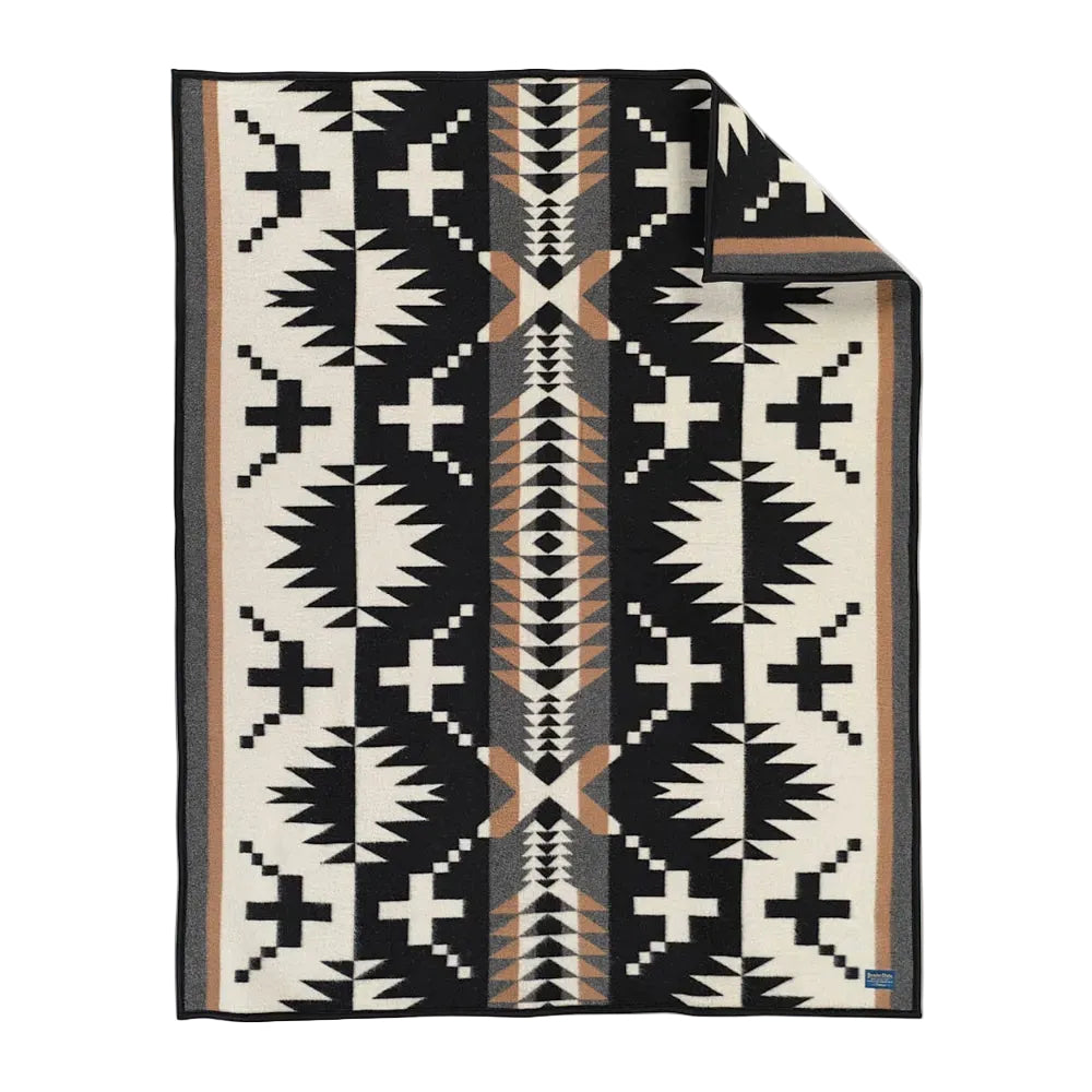 Pendleton Jacquard Napped Throw in Spider Rock Black/White featuring a bold Southwestern geometric pattern.