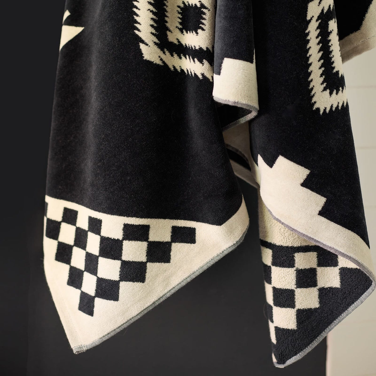 Close-up of Pendleton Los Ojos Jacquard Spa Towel highlighting the plush cotton velour and geometric woven design.