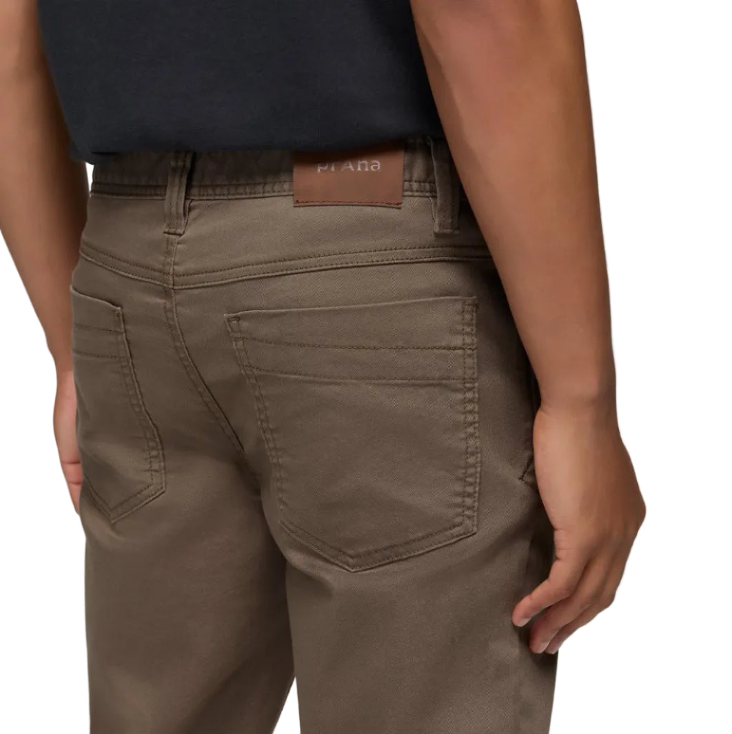 Detail view of the stretch denim and five-pocket construction on the prAna Men’s Bridger Slim Jean in Mud