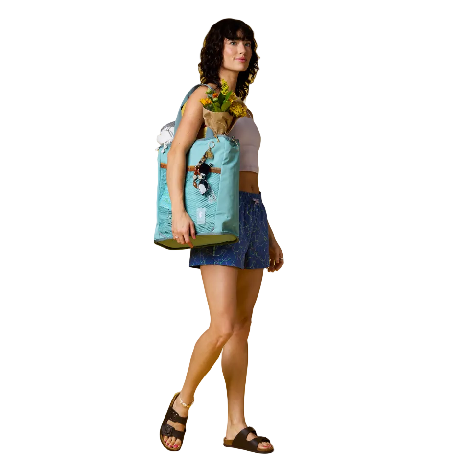 Cotopaxi everyday tote backpack used in urban setting