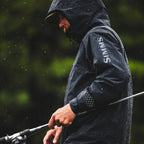 Angler wearing the Simms Men’s ProDry Fishing Jacket in Black