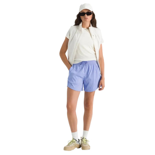 Full-body view of woman wearing The North Face Aphrodite Arise 5" Short in Periwinkle Glow