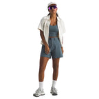 Full-body view of woman wearing The North Face Basin Short 5" in Granite Grey